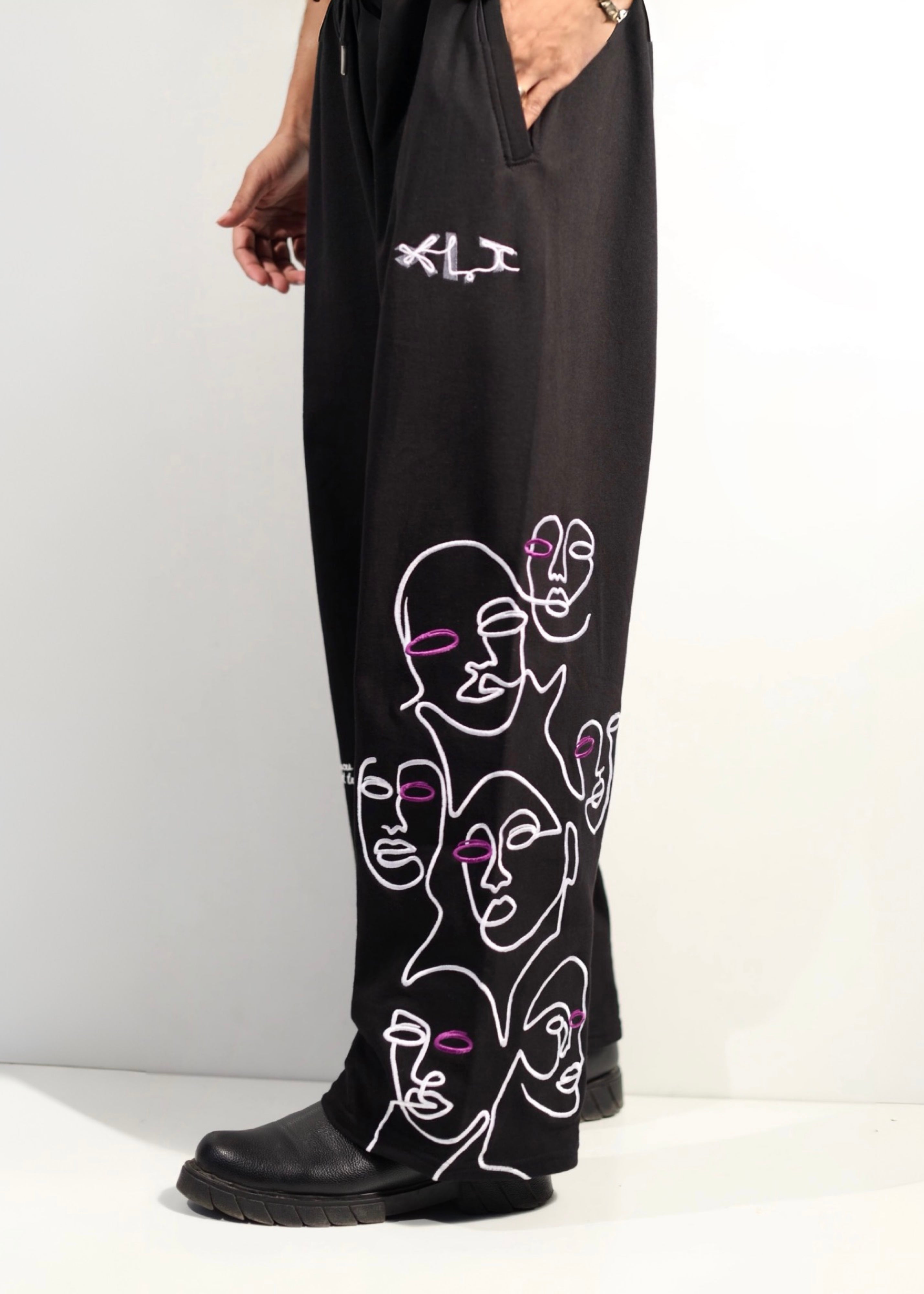BLACK ‘VOID FACES’ PANTS