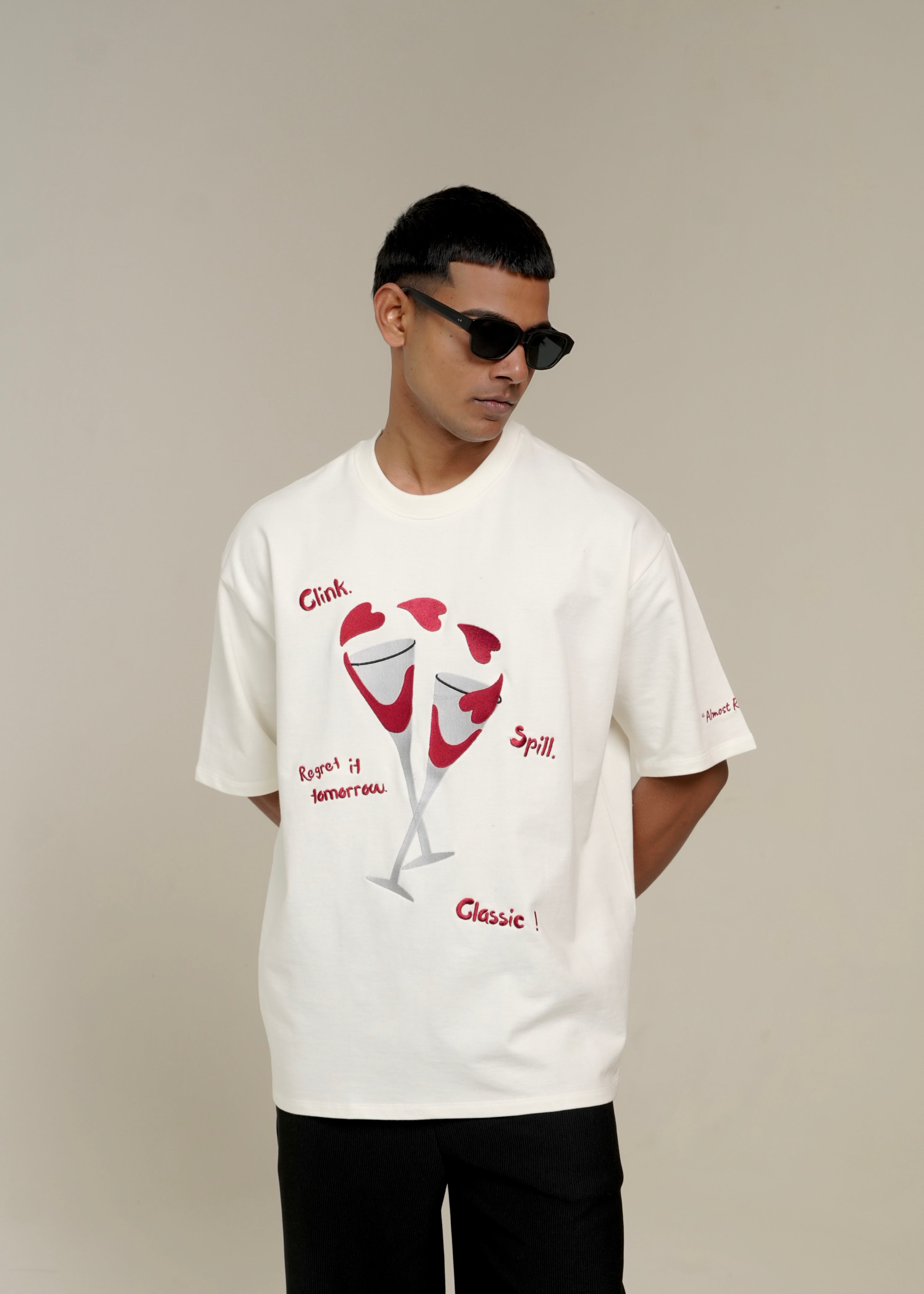 ‘CLINK & CONFESS’ .TEE | OFF WHITE