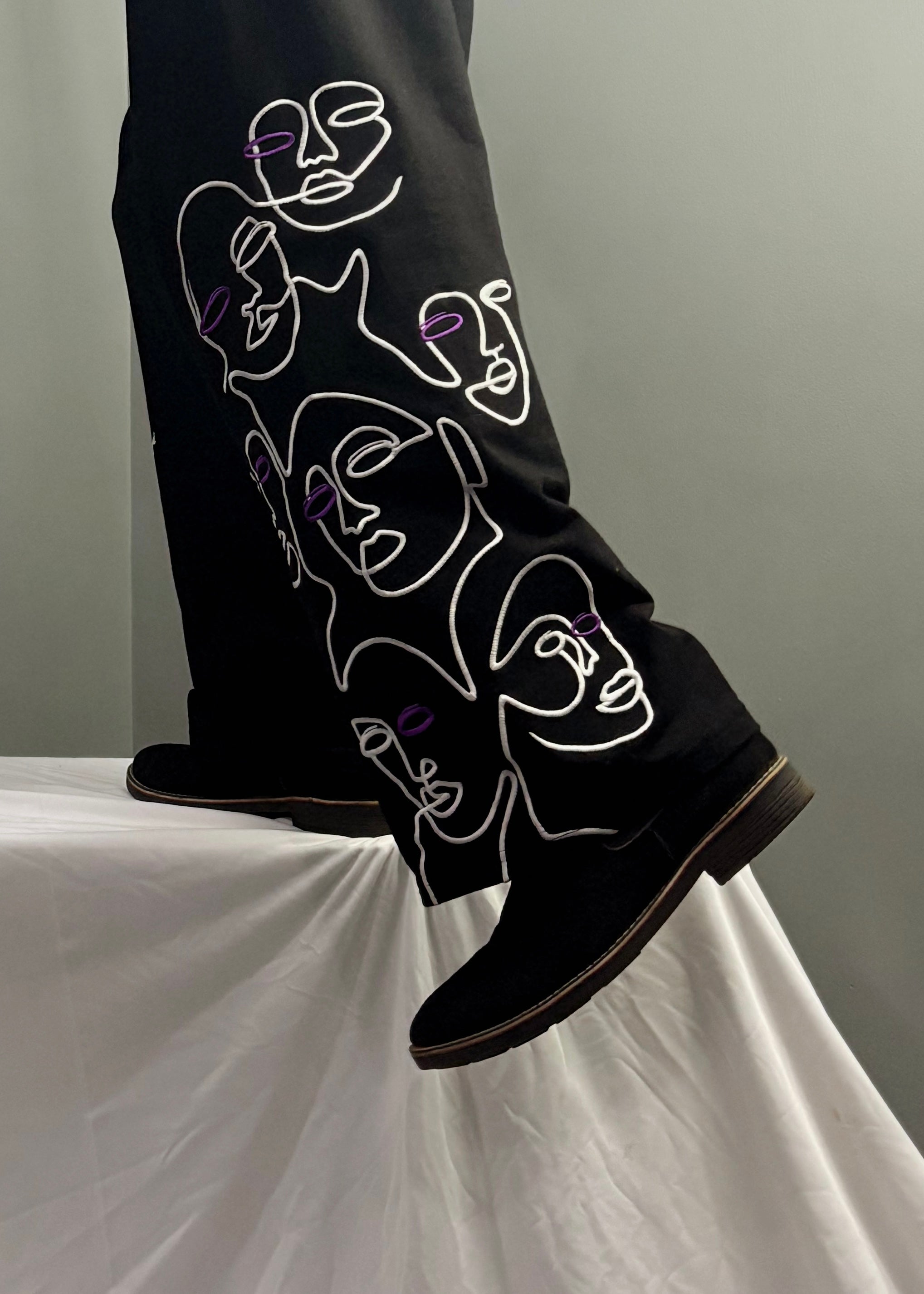 BLACK ‘VOID FACES’ PANTS