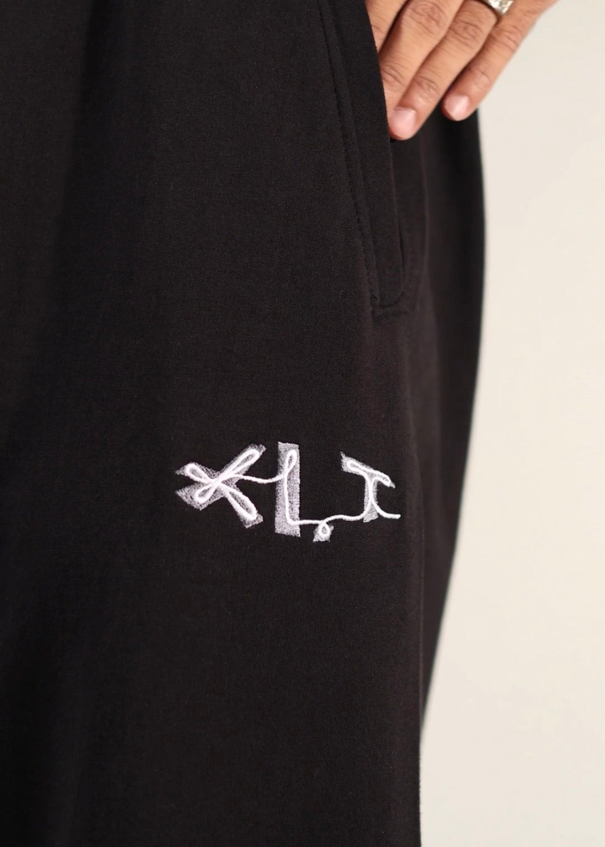 BLACK ‘VOID FACES’ PANTS