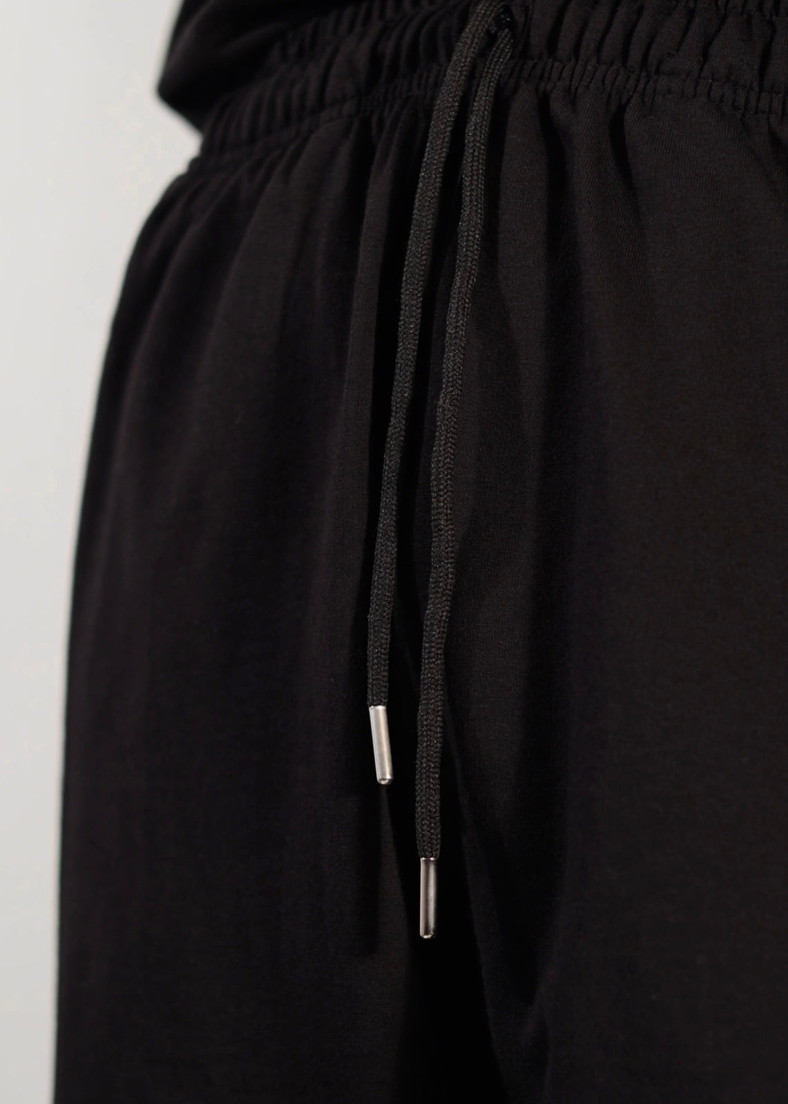 BLACK ‘VOID FACES’ PANTS