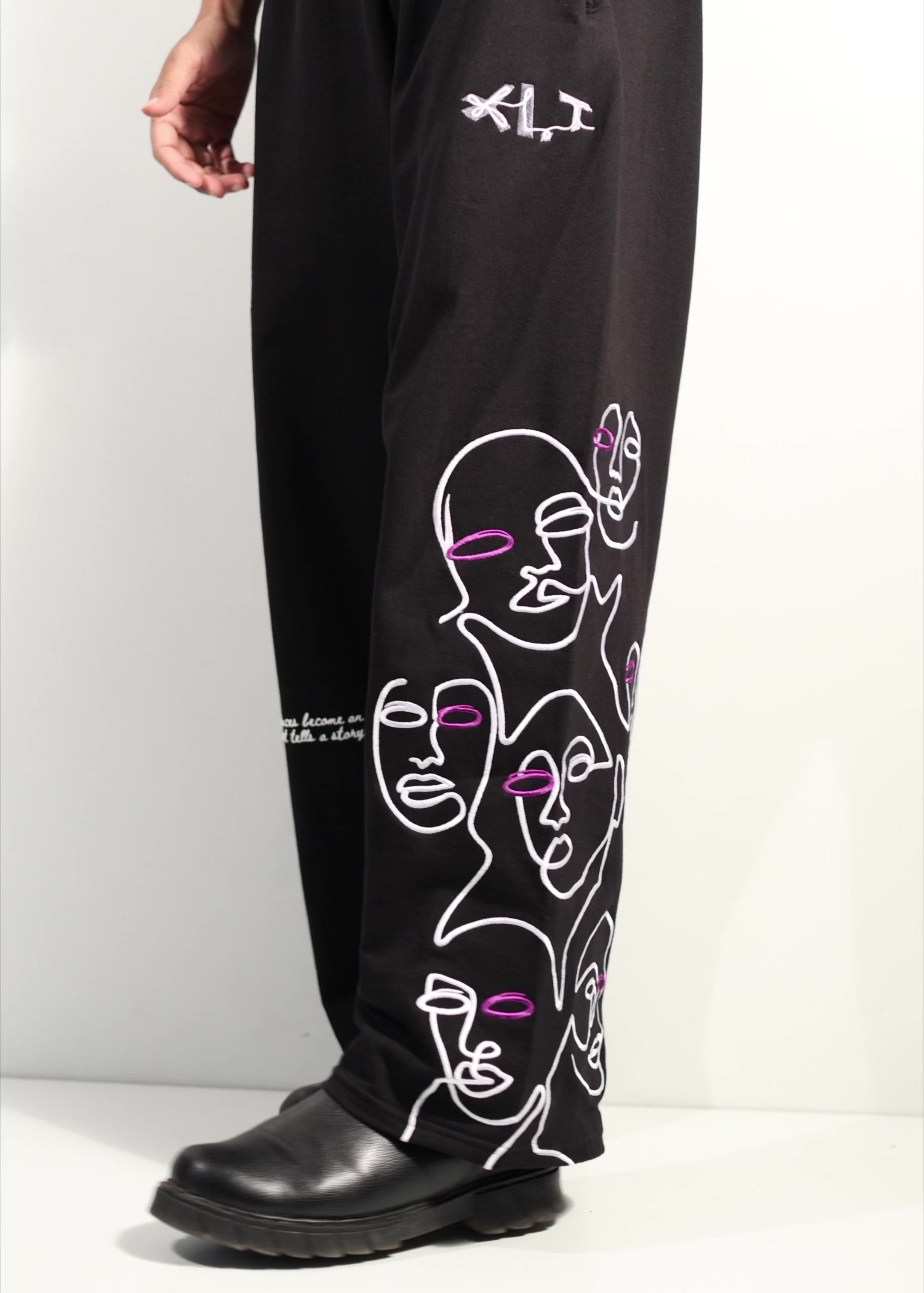 BLACK ‘VOID FACES’ PANTS